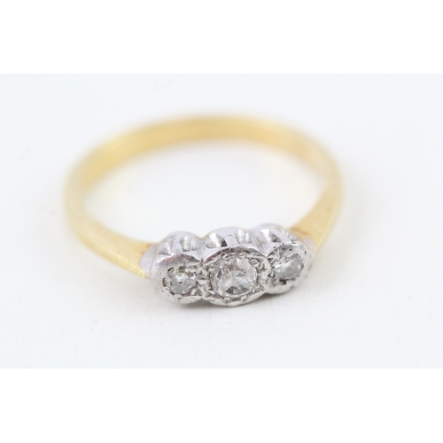 174 - 18ct gold vintage diamond three stone ring (2.4g) Size  K 1/2