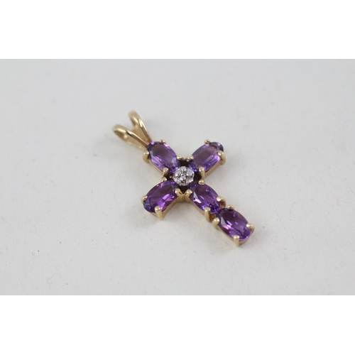 177 - 2 x 9ct gold amethyst set crucifix/ cross pendants inc diamonds (2.4g)