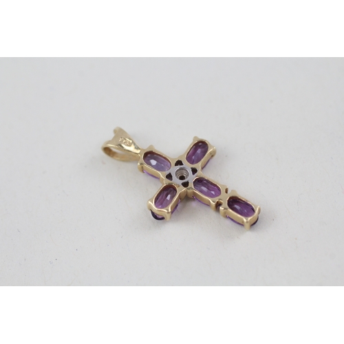 177 - 2 x 9ct gold amethyst set crucifix/ cross pendants inc diamonds (2.4g)