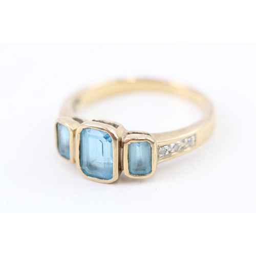 178 - 9ct gold bezel set blue topaz & diamond dress ring (2.9g) Size  O