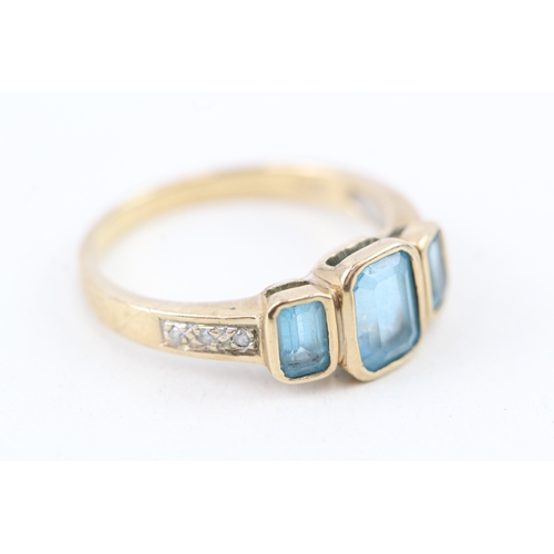 178 - 9ct gold bezel set blue topaz & diamond dress ring (2.9g) Size  O