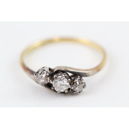 183 - 18ct gold vintage diamond three stone ring (1.9g) Size  M