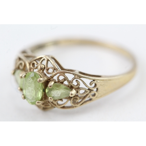 187 - 9ct gold vintage style peridot patterned dress ring (1.7g) Size  Q 1/2