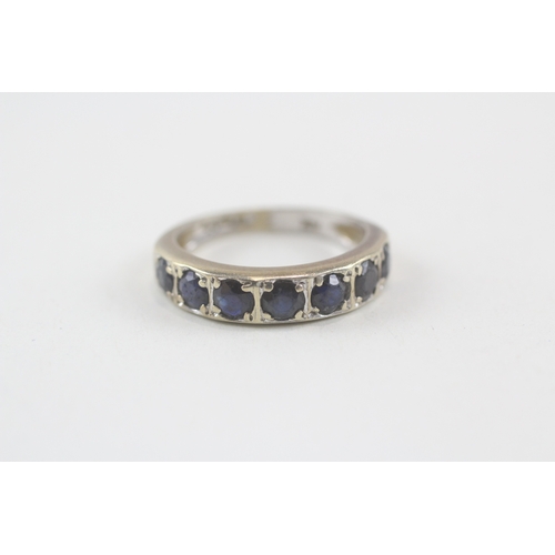 204 - 9ct gold sapphire half eternity ring (3.3g) Size  N