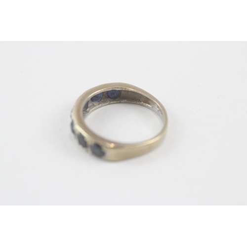 204 - 9ct gold sapphire half eternity ring (3.3g) Size  N