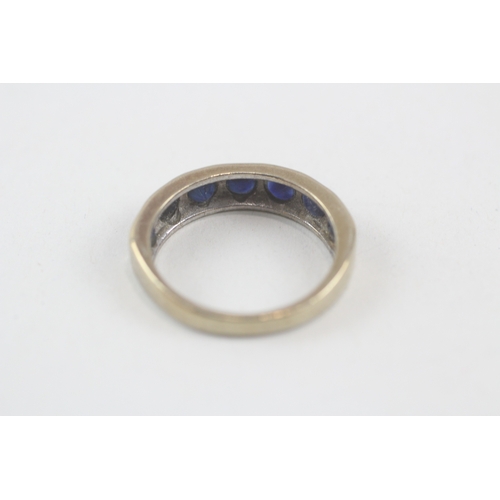 204 - 9ct gold sapphire half eternity ring (3.3g) Size  N