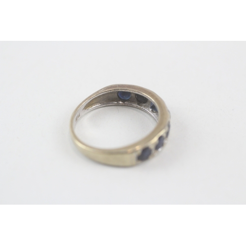 204 - 9ct gold sapphire half eternity ring (3.3g) Size  N