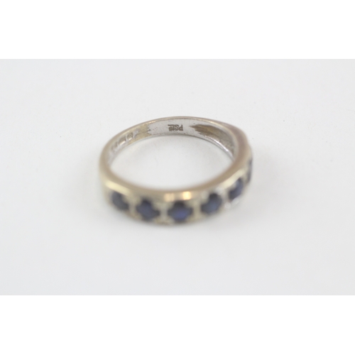 204 - 9ct gold sapphire half eternity ring (3.3g) Size  N