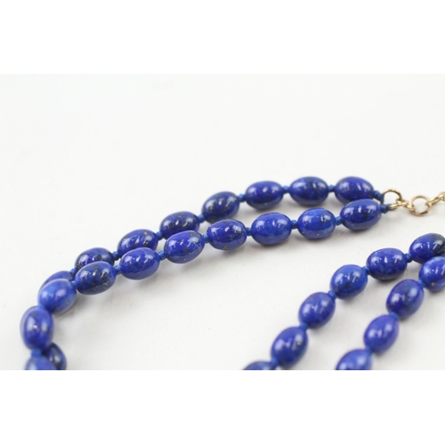 206 - 9ct gold clasp lapis lazuli beaded necklace individually knotted (12g)