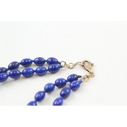 206 - 9ct gold clasp lapis lazuli beaded necklace individually knotted (12g)