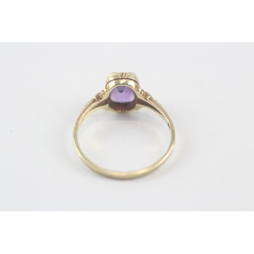 208 - 14ct gold vintage style amethyst dress ring with patterned shoulders (2.3g) Size  O