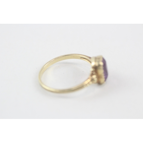 208 - 14ct gold vintage style amethyst dress ring with patterned shoulders (2.3g) Size  O