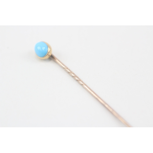 210 - 15ct gold antique turquoise stickpin with a 9ct gold pin (1.8g)