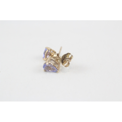 213 - 9ct gold pear cut tanzanite stud earrings (0.8g)