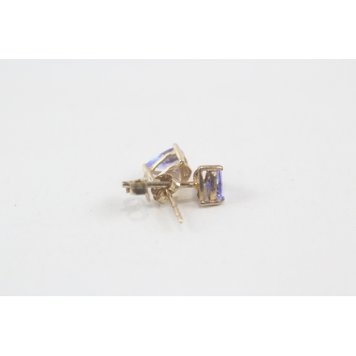 213 - 9ct gold pear cut tanzanite stud earrings (0.8g)