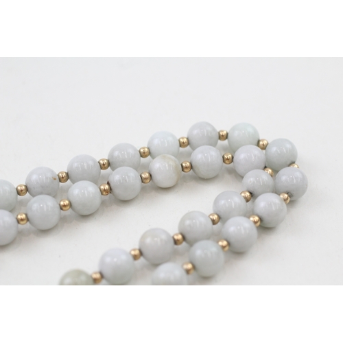 218 - 14ct gold clasped jade beaded necklace with 14ct gold spacer beads (42.3g)