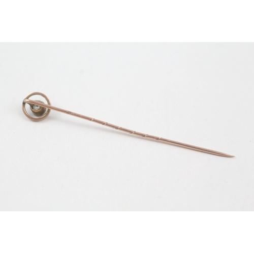 229 - 9ct gold antique paste set stick pin (0.7g)