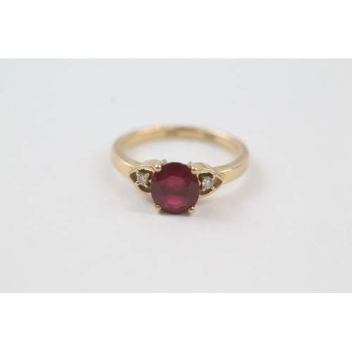 232 - 14ct gold red gemstone solitaire dress ring with diamond set heart shoulders (2.6g) Size  J 1/2