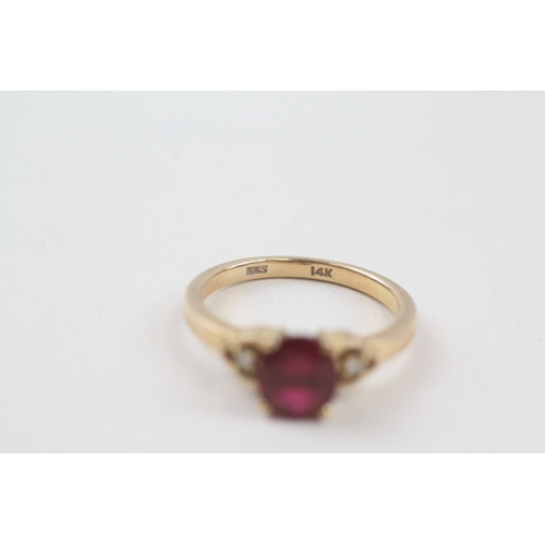 232 - 14ct gold red gemstone solitaire dress ring with diamond set heart shoulders (2.6g) Size  J 1/2