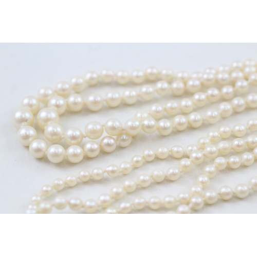 238 - 9ct white gold and white gemset clasp cultured pearl necklace (27.8g)