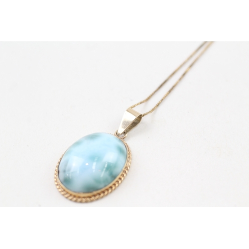 241 - 14ct gold larimar pendant with 9ct gold chain (5g)