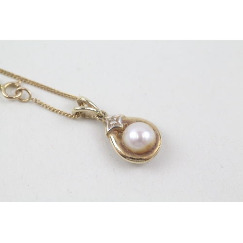 244 - 9ct gold cultured pearl and diamond pendant with 9ct gold chain (2.5g)