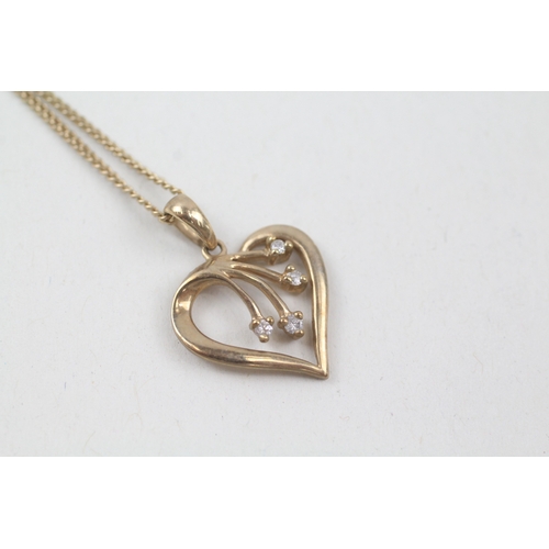 246 - 9ct gold diamond set heart pendant with 9ct gold chain (2.7g)