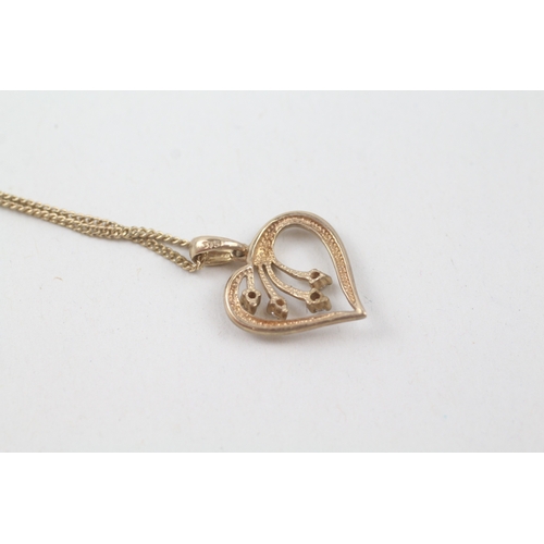 246 - 9ct gold diamond set heart pendant with 9ct gold chain (2.7g)