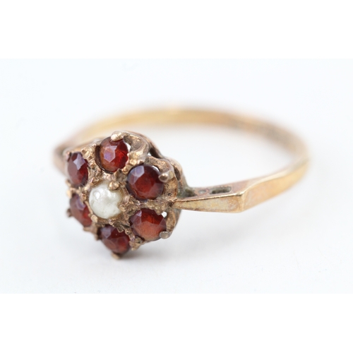 249 - 9ct gold 1970's garnet & seed pearl cluster ring (1.7g) Size  L 1/2