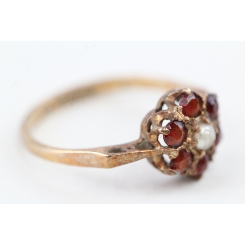 249 - 9ct gold 1970's garnet & seed pearl cluster ring (1.7g) Size  L 1/2