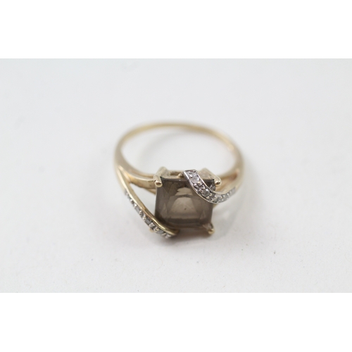 29 - 9ct gold smokey quartz and diamond dress ring (2.3g) Size  N