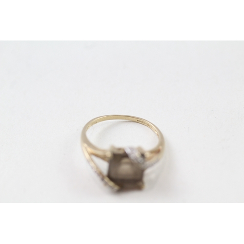 29 - 9ct gold smokey quartz and diamond dress ring (2.3g) Size  N