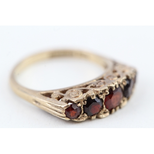 50 - 9ct gold vintage garnet five stone ring with a patterned gallery (3.6g) Size  N