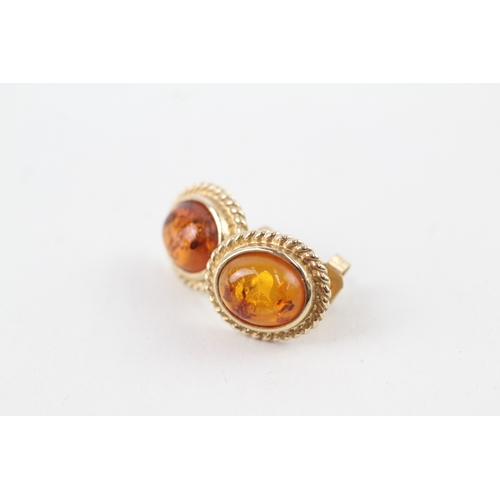 53 - 9ct gold vintage amber stud earrings with scroll backs (3.2g)