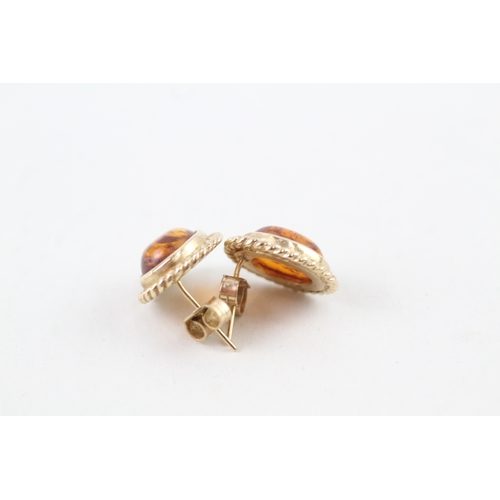 53 - 9ct gold vintage amber stud earrings with scroll backs (3.2g)