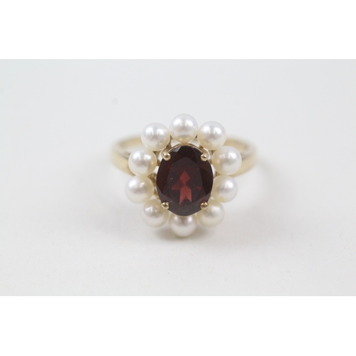 55 - 9ct gold garnet and cultured pearl halo cocktail ring (4.2g) Size  V