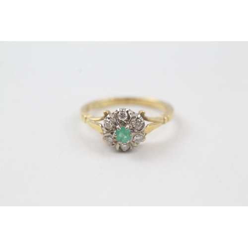 58 - 18ct gold emerald and diamond halo dress ring (3.7g) Size  M 1/2