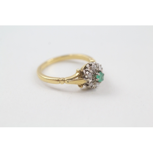 58 - 18ct gold emerald and diamond halo dress ring (3.7g) Size  M 1/2