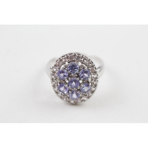 61 - 9ct white gold tanzanite and white sapphire cluster cocktail ring (3.6g) Size  O