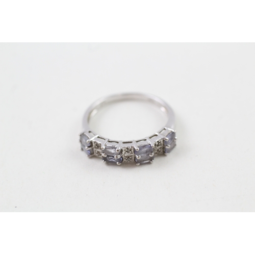 62 - 9ct white gold tanzanite and diamond double row half eternity dress ring (2.3g) Size  N