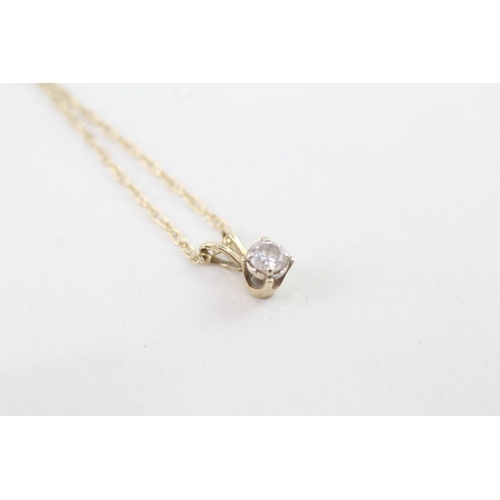 76 - 9ct gold diamond solitaire pendant necklace (1.1g)