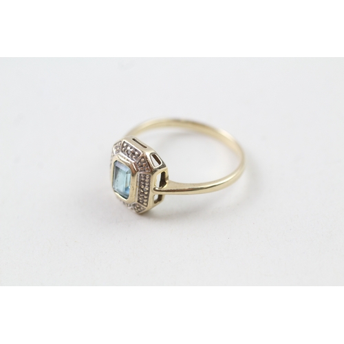 89 - 9ct gold vintage blue topaz and diamond halo dress ring (2.5g) Size  P