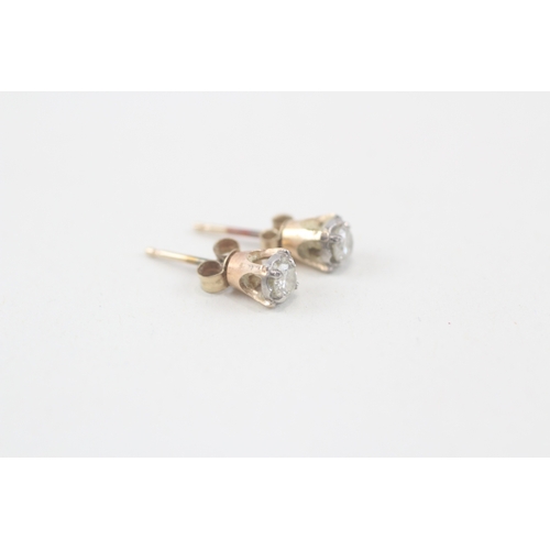 104 - 9ct gold diamond stud earrings (0.8g)