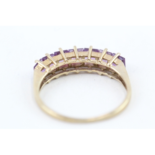 108 - 9ct gold square cut amethyst half eternity ring (1.5g) Size  M 1/2