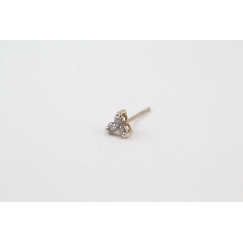 111 - 9ct gold diamond three stone stud earrings (0.5g)