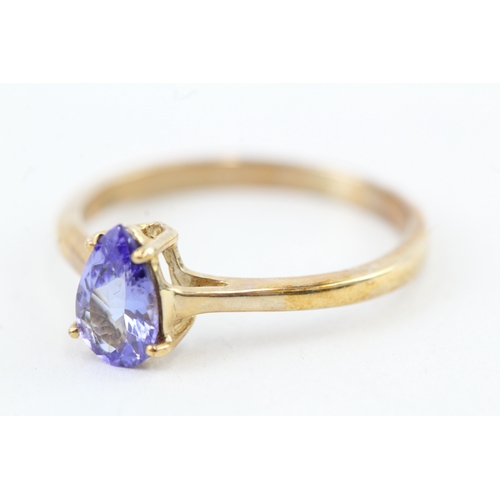 114 - 9ct gold pear cut tanzanite dress ring (1.8g) Size  O