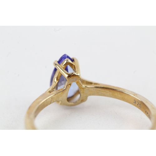 114 - 9ct gold pear cut tanzanite dress ring (1.8g) Size  O