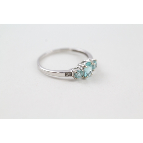 128 - 9ct white gold apatite trilogy dress ring with diamond set shoulders (1.1g) Size  O