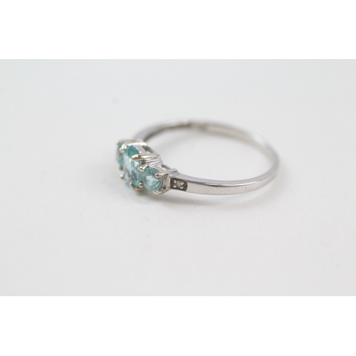 128 - 9ct white gold apatite trilogy dress ring with diamond set shoulders (1.1g) Size  O