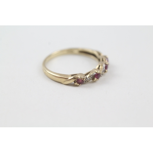 129 - 9ct gold ruby and diamond wave design dress ring (2g) Size  P 1/2